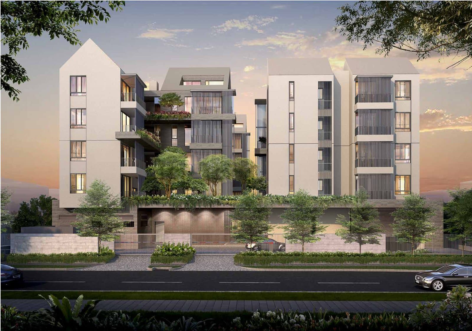 10 Evelyn: the five-storey blocks with their pitched roofs and planted facades on Evelyn Road at dusk