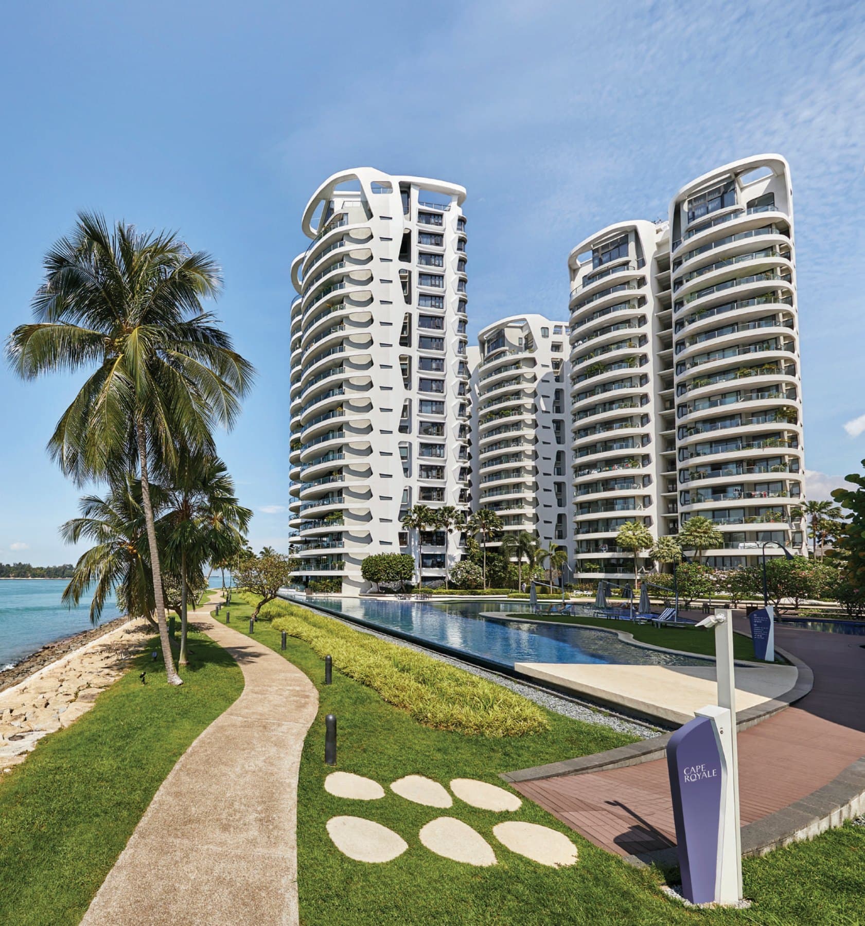Cape Royale, photograph: the curved towers by the seafront pool at Sentosa Cove