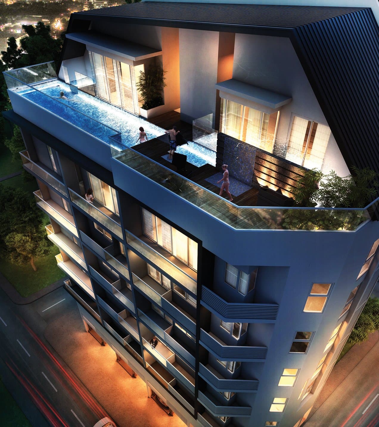 Opal Suites: the six-storey block with its rooftop pool, at dusk
