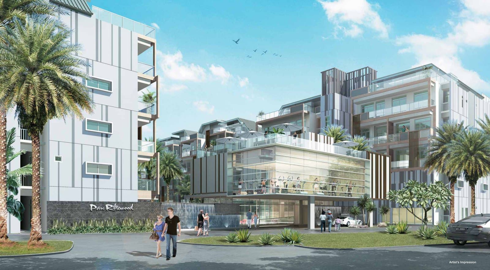Artist's impression of Parc Rosewood from the entrance: a glass-fronted two-storey club house with a gym on its upper floor, five-storey blocks with balconies and roof terraces behind it, palms and a driveway in front, under a blue sky
