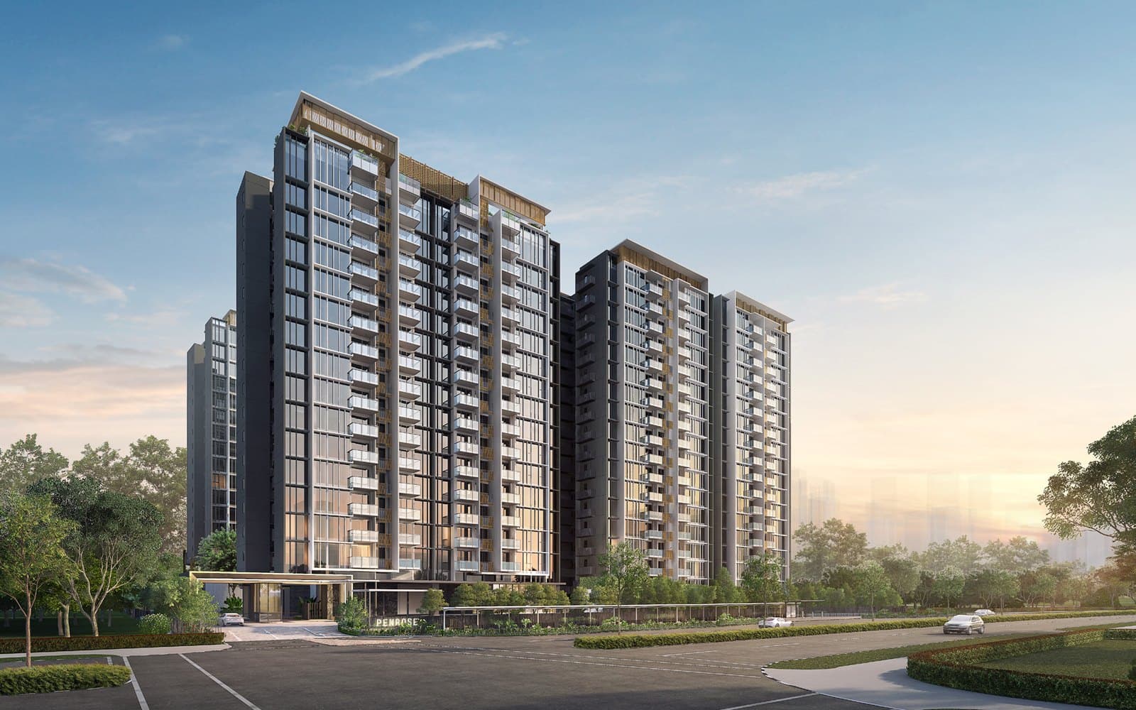 Artist's impression of Penrose at dusk from Sims Drive: 18-storey towers in dark grey and glass with rows of balconies and timber-coloured screens at the roof, the entrance canopy and trees in front