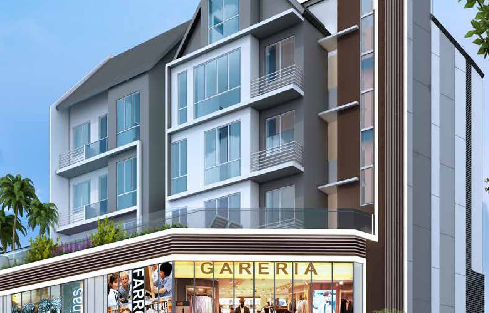 Prestige Point: a five-storey block with shops on the lower two storeys and homes with balconies above, on Upper Paya Lebar Road