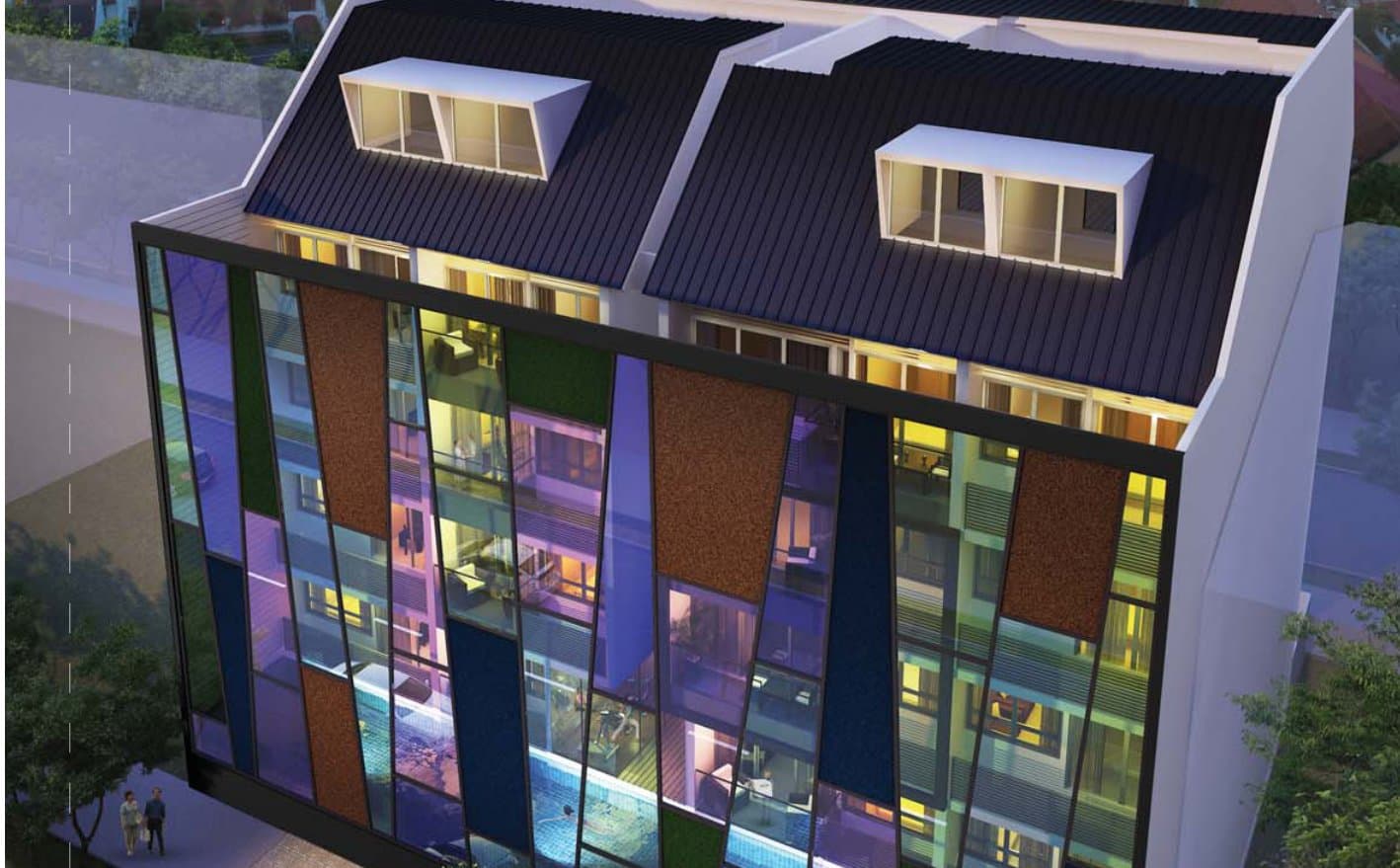Presto @ Upper Serangoon at dusk: a five-storey block with a coloured glass facade and twin pitched roofs on Upper Serangoon Road