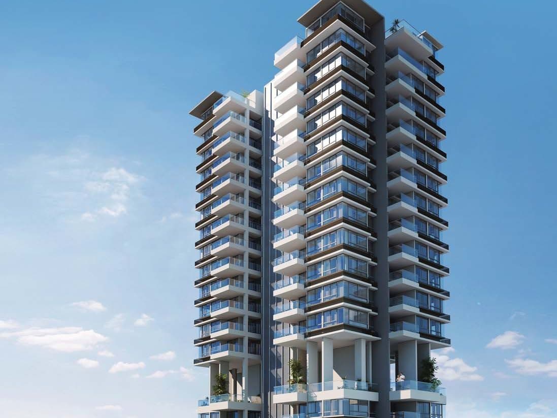 Artist's impression of Regent Residences: the upper storeys of the 26-storey tower with glass balconies against the sky