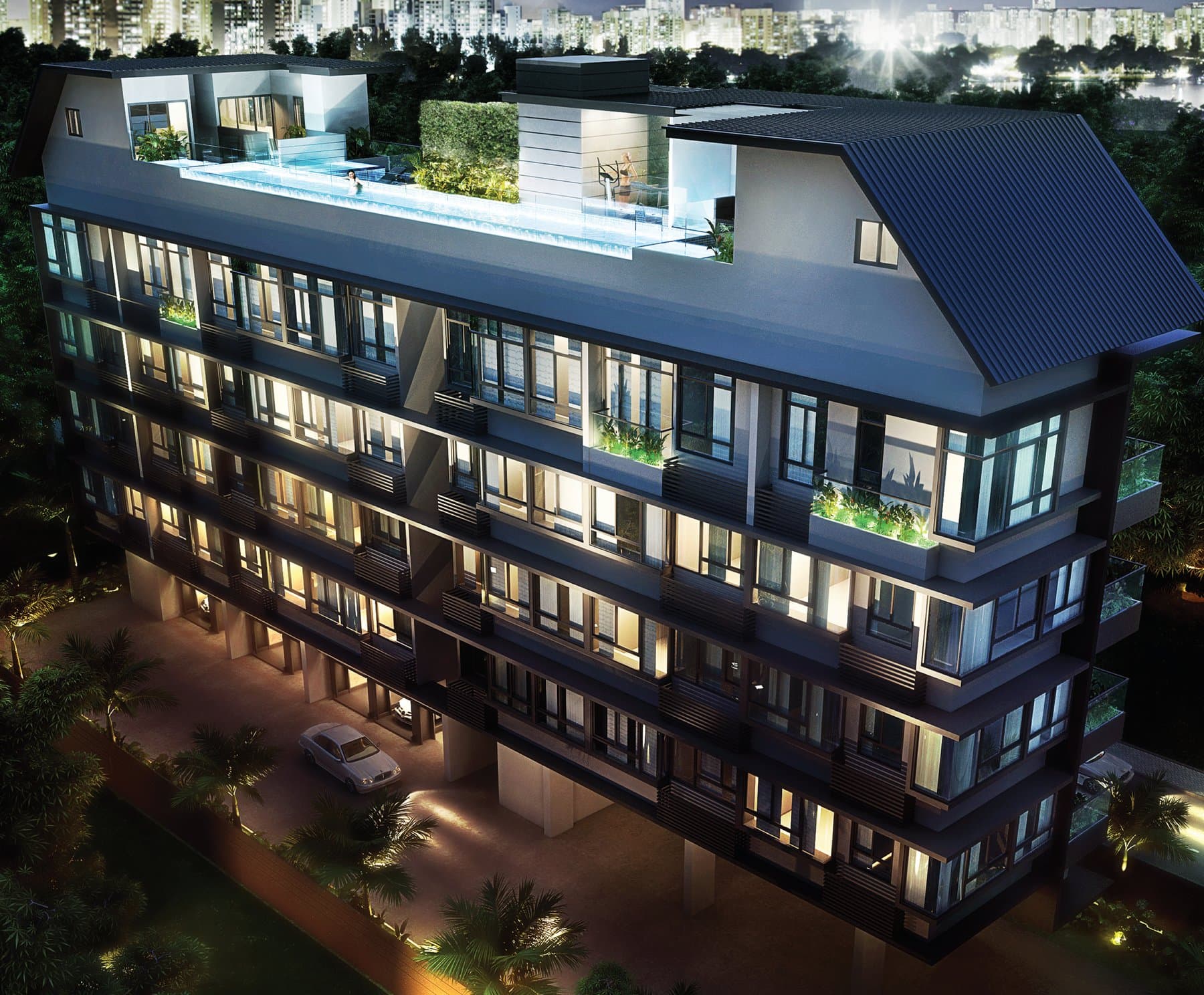 Suites @ Eunos: the five-storey block with its rooftop pool, at night