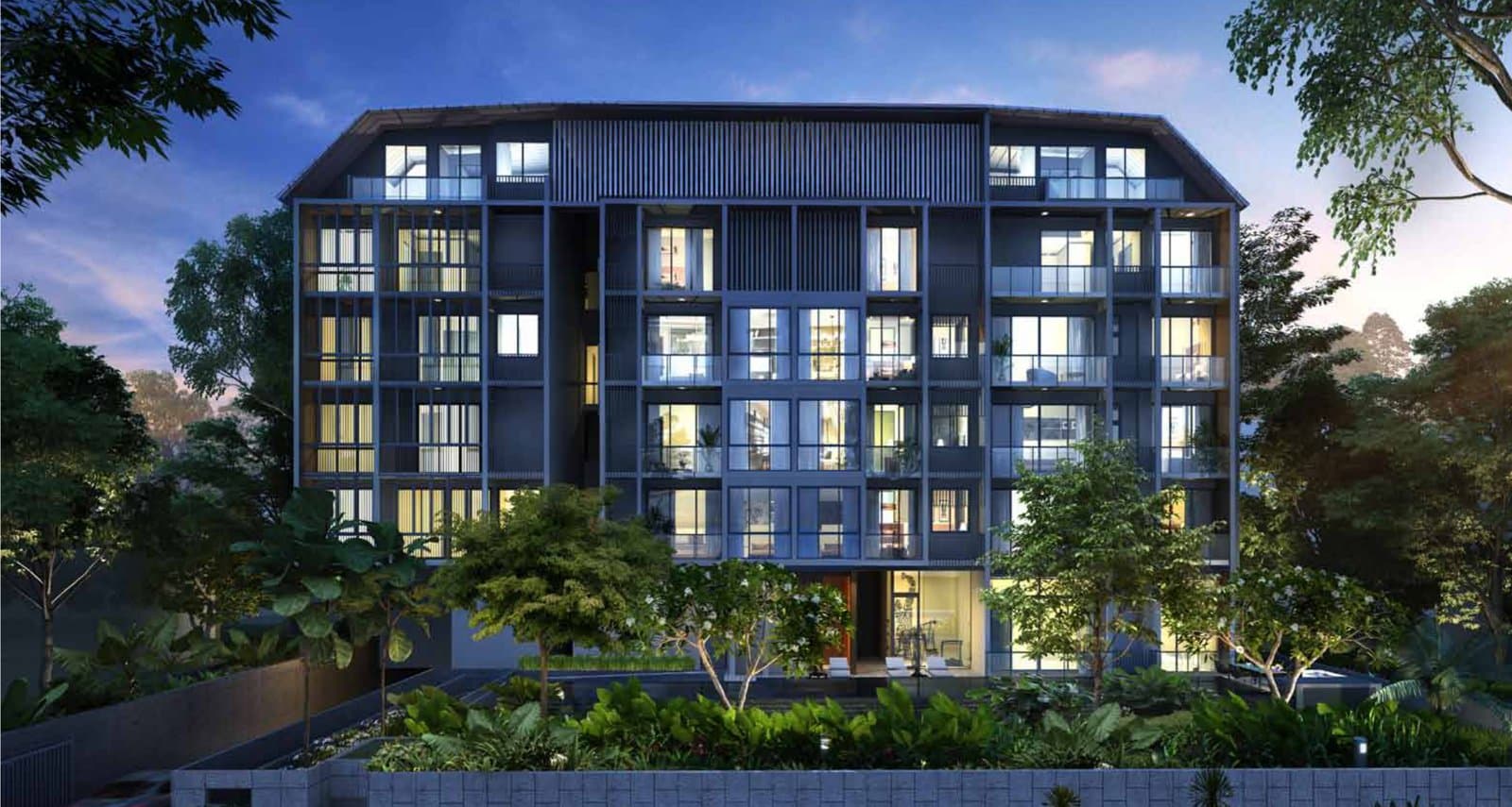 The Enclave Holland: the five-storey block behind its garden wall at dusk