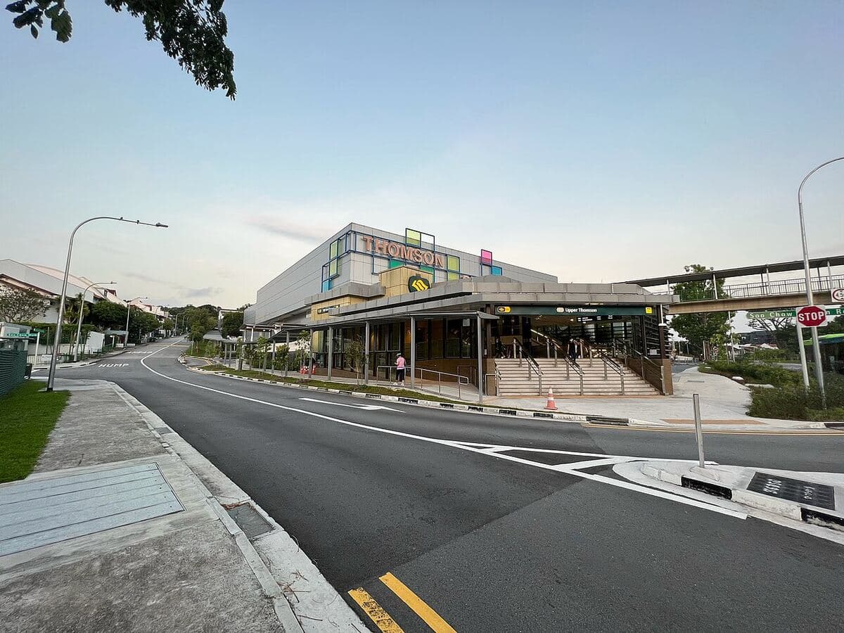 Street entrance of Upper Thomson MRT station with Thomson Plaza behind it
