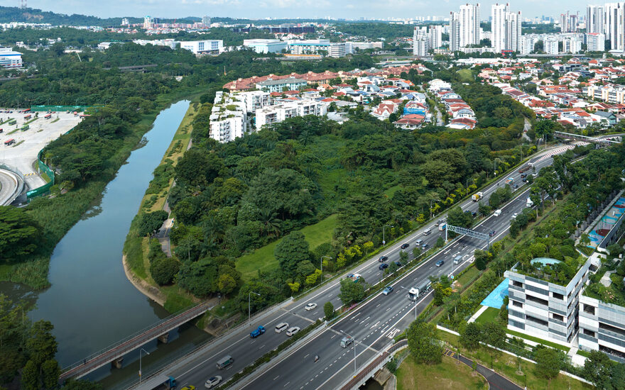 The Faber Walk site along Sungei Ulu Pandan — a river-fronting plot in a landed estate, with the AYE and Clementi's towers beyond.